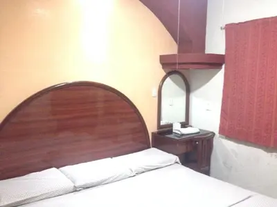 Cama o camas de una habitación en Hotel Xalapa