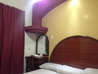 Cama o camas de una habitación en Hotel Xalapa