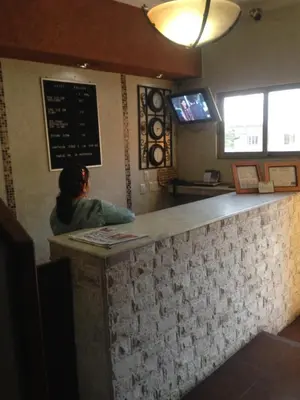 Una televisión o centro de entretenimiento en Hotel Xalapa