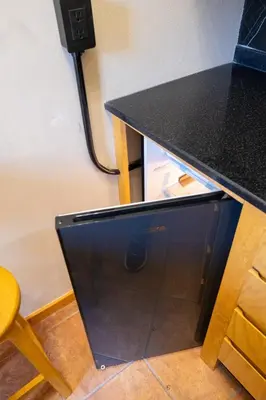 Una televisión o centro de entretenimiento en Suites Patio Antequera