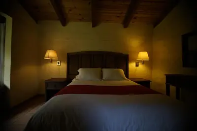 Cama o camas de una habitación en Cabañas La Cascada