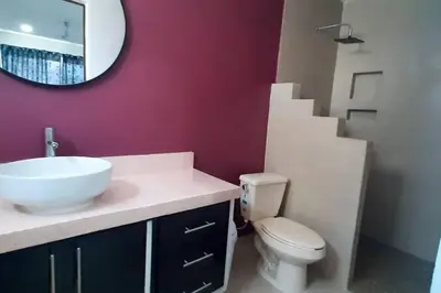 Un baño de Villa De Santos Acapulco Playa Bonfil Alberca