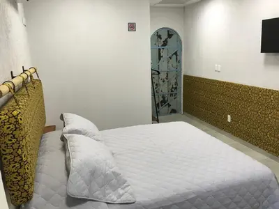 Cama o camas de una habitación en Las heliconias 3 moderno loft