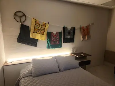 Cama o camas de una habitación en Hermosa Hacienda Las Heliconias