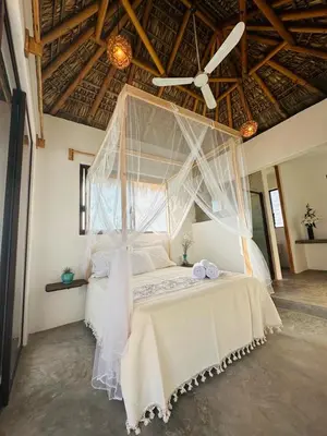Cama o camas de una habitación en Private Beach House in AguaBlanca Peaceful Getaway