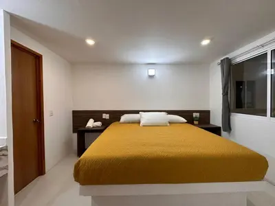 Cama o camas de una habitación en Hotel Quinta Luna Zacatlán