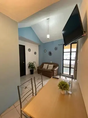 Una televisión o centro de entretenimiento en Hotel Quinta Luna Zacatlán