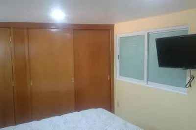 Una televisión o centro de entretenimiento en grupos familiares 2
