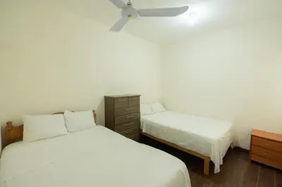 Cama o camas de una habitación en Casa Blanca