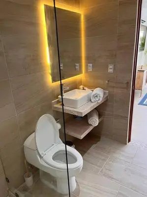 Un baño de Depto en Diamante con Club de Playa Privado