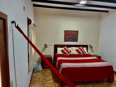 Cama o camas de una habitación en Hotel casa teresa café galería