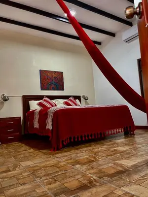 Cama o camas de una habitación en Hotel casa teresa café galería