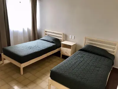 Cama o camas de una habitación en Céntrico Live