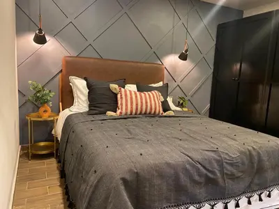 Cama o camas de una habitación en Layoo, Tu casa en Oaxaca 101