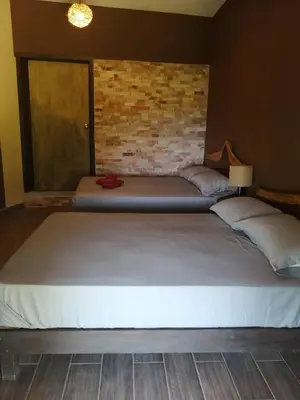 Cama o camas de una habitación en HOTEL AVE FENIX