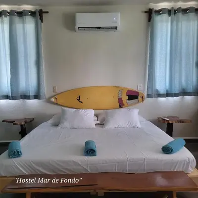 Cama o camas de una habitación en Mar de Fondo