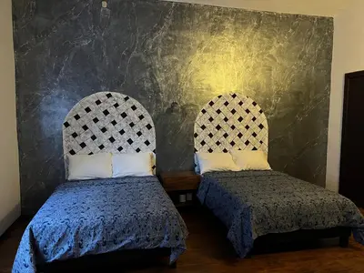 Cama o camas de una habitación en Catedral 304