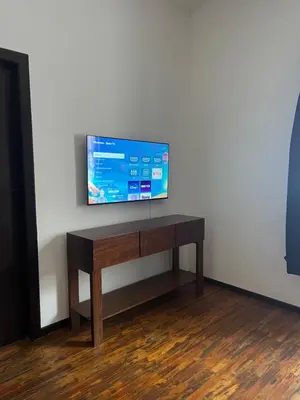 Una televisión o centro de entretenimiento en Catedral 304