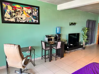 Una televisión o centro de entretenimiento en Brisa del Mar #6