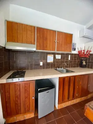 Una cocina o zona de cocina en Suites Acapulco Yamba