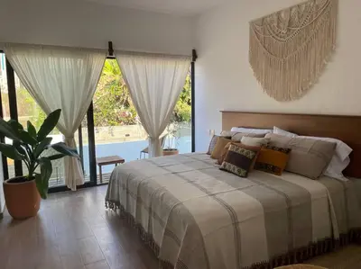 Cama o camas de una habitación en Casa Tres Iguanas, La Punta