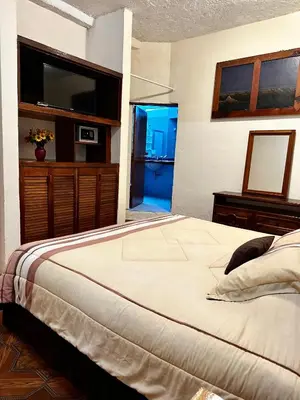 Cama o camas de una habitación en BUNGALOWS ANDREA