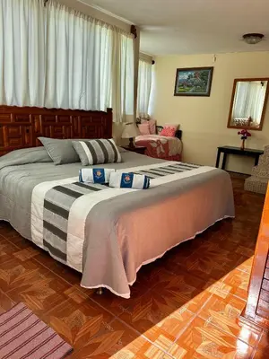Cama o camas de una habitación en BUNGALOWS ANDREA
