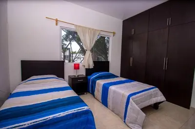 Cama o camas de una habitación en ¡Nueva! Bamboo La Guayaba (Alberca & Descanso)