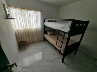 Cama o camas de una habitación en Departamento Acapulco Diamante - 2 habitaciones
