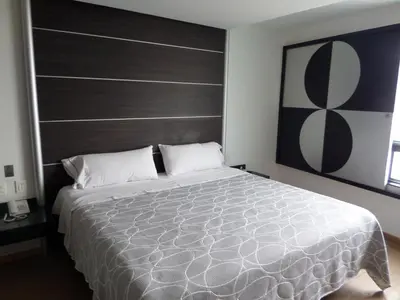 Cama o camas de una habitación en Novo Coapa