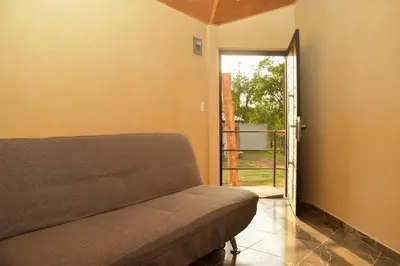 Zona de estar de Cabañas De la Vega