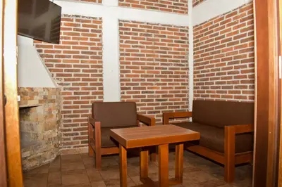 Zona de estar de Cabañas De la Vega