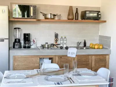 Una cocina o zona de cocina en Rooms Huatulco