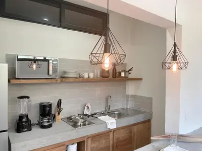 Una cocina o zona de cocina en Rooms Huatulco
