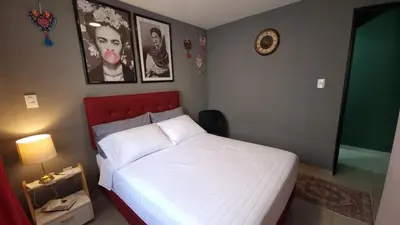 Cama o camas de una habitación en Departamento Completo Frente al Aeropuerto