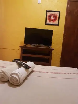 Una televisión o centro de entretenimiento en Posada la Natividad