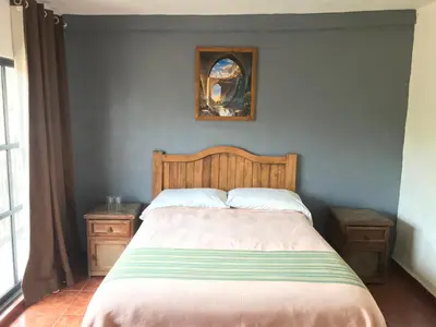 Cama o camas de una habitación en Posada Temazcal Santo Domingo