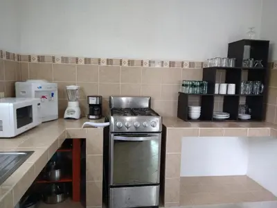 Una cocina o zona de cocina en Casa con alberca privada y agradable jardín