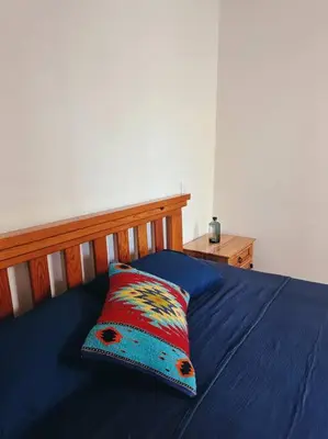Cama o camas de una habitación en Casa Nabani Oaxaca
