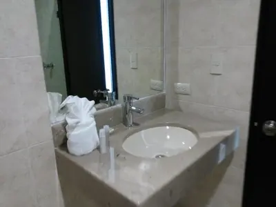 Un baño de Hotel Osalle Inn