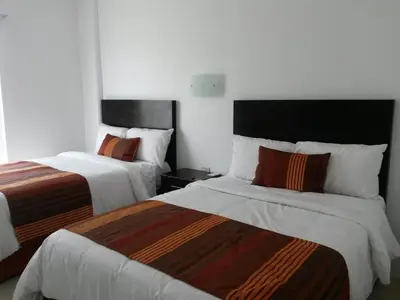 Cama o camas de una habitación en Hotel Osalle Inn