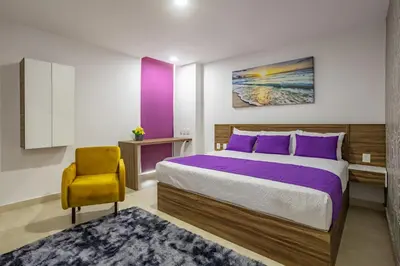 Cama o camas de una habitación en WIN DAY Veracruz - Hotel Express