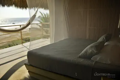 Cama o camas de una habitación en UtopiAmar Beach House & Suites