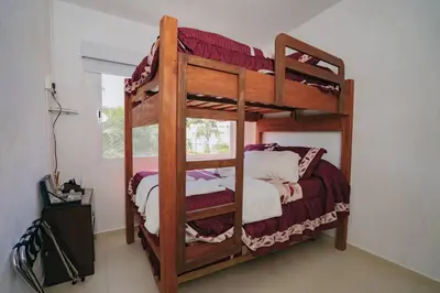 Cama o camas de una habitación en Casa entera Alberca en Acapulco Diamante