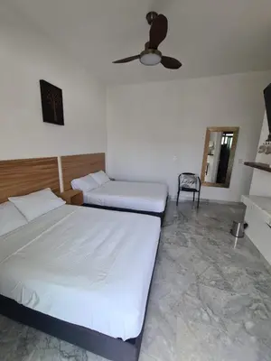 Cama o camas de una habitación en Habitaciones Casa Blanca Oaxtepec Tlayacapan