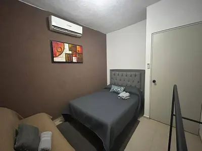 Una televisión o centro de entretenimiento en ¡Descubre tu oasis en Acapulco! Casa vacacional.