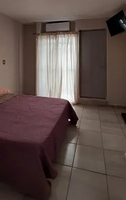 Cama o camas de una habitación en Residencial Aeropuerto