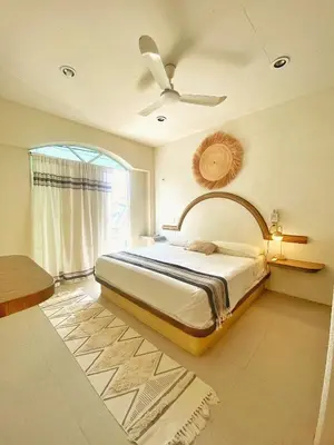 Cama o camas de una habitación en Sunset Apartament Starlink, Myhomepuertoescondido
