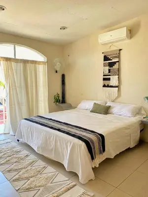 Cama o camas de una habitación en Sunset Apartament Starlink, Myhomepuertoescondido