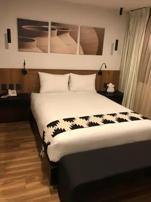 Cama o camas de una habitación en Casa Tlaxcalli by Beddo Hoteles